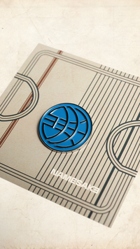 NAMESAKE GLOBE PIN OCEAN BLUE